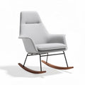 Fauteuil à bascule en tissu gris avec structure en métal et accoudoirs ergonomiques